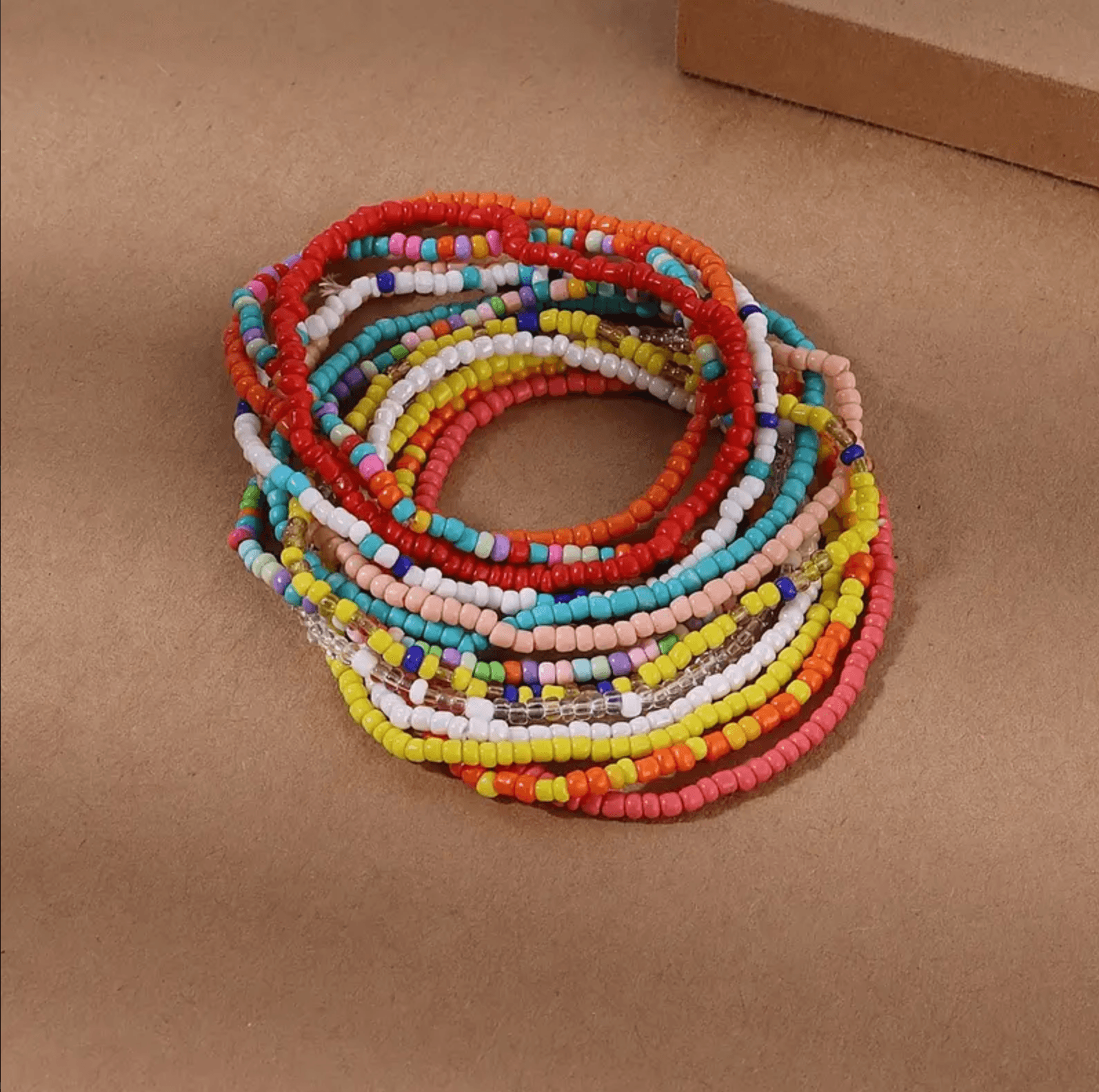 a stack of bracelets sitting on top of a table